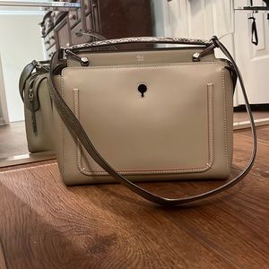 Fendi medium tote. Leather and snake skin with silver embellishments.